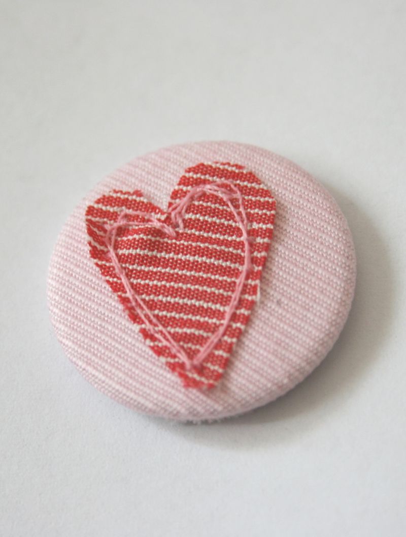 Heart badge on white background